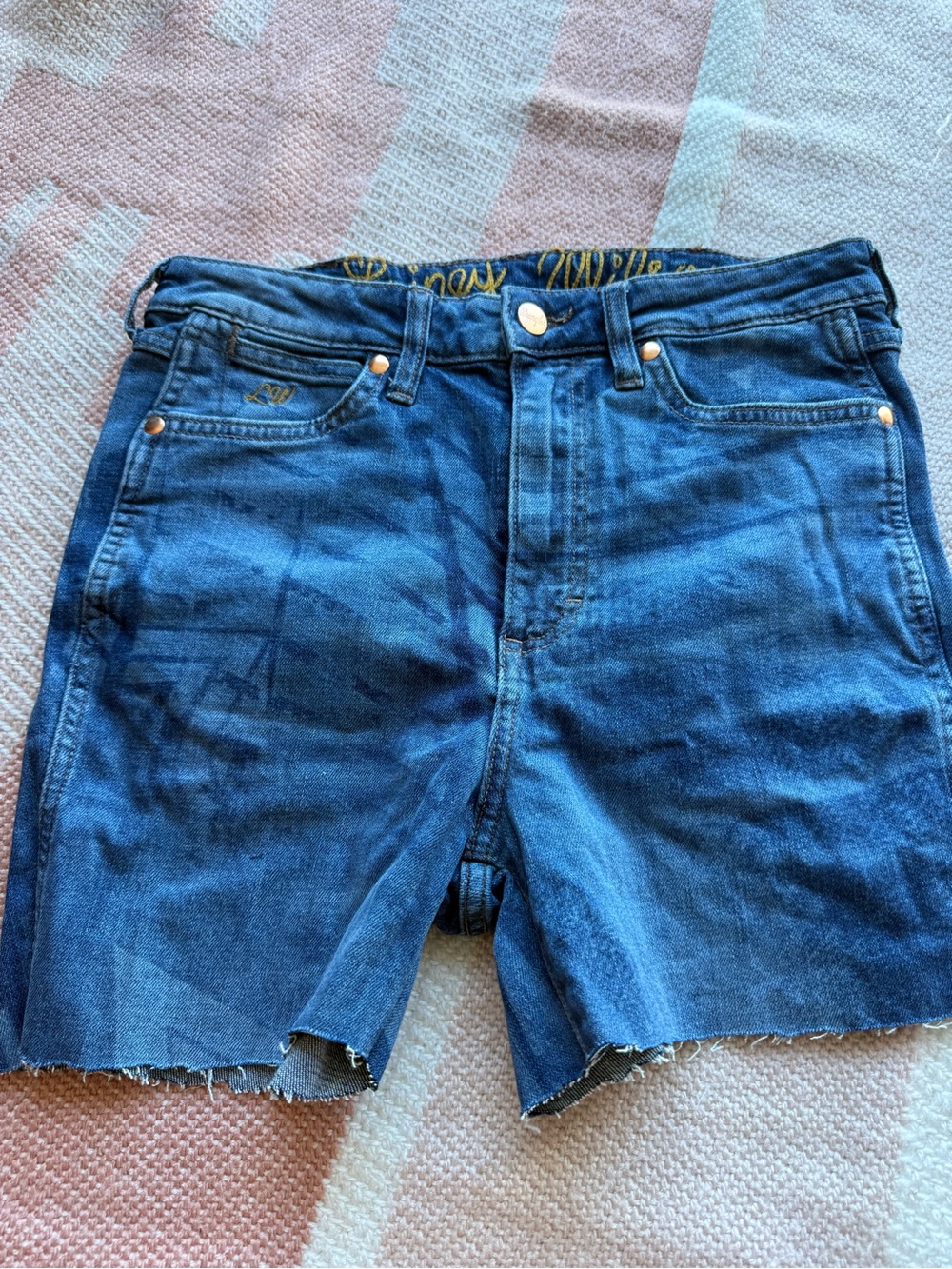 Woman’s Lainey Wilson Blue Denim Cutoff Shorts